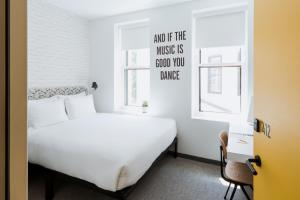Postel nebo postele na pokoji v ubytování Hotel Hive