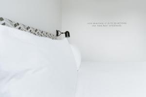 Postel nebo postele na pokoji v ubytování Hotel Hive