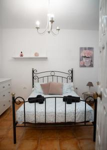 Ένα ή περισσότερα κρεβάτια σε δωμάτιο στο Casa Lizi ,Canarian house with breathtaking view