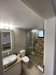 Koupelna v ubytování Trocadero Luxury Suites