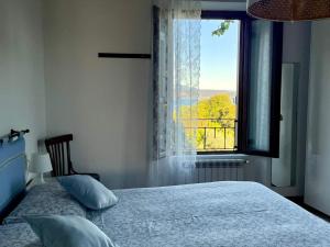 A bed or beds in a room at Agriturismo valsiniga Még 35 kép