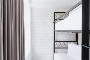 Postel nebo postele na pokoji v ubytování Hotel Hive