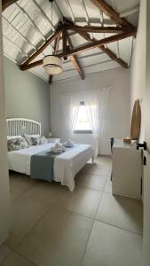 A bed or beds in a room at VILLA ANTHIMOS