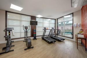 a gym with treadmills and ellipticals in a room at Intercity Itupeva in Itupeva +34 photos