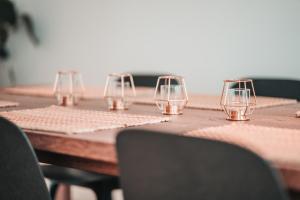 a group of wine glasses sitting on a table at ZILTer - Groot duplex appartement met terras in Ostend