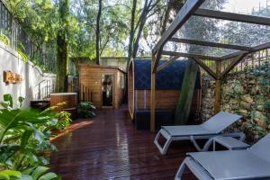 Um jardim em Casa Vela Boutique House