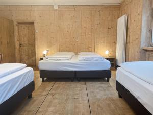 Postel nebo postele na pokoji v ubytování Albergo Al Pin