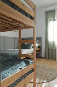 Cama ou camas em um quarto em Old Village Hostel