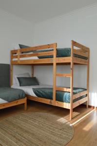 Cama ou camas em um quarto em Old Village Hostel