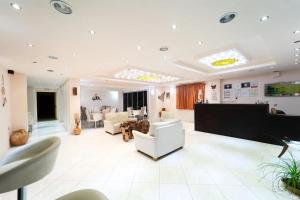 Posedenie v ubytovaní Golden Rose Suites