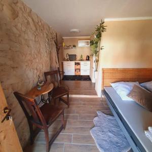 Postel nebo postele na pokoji v ubytování Appartment für 2 Personen mit eigenem Bad und Küche