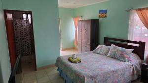Postel nebo postele na pokoji v ubytování Hostal Mirador
