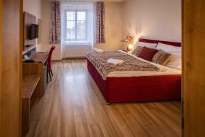 Ένα ή περισσότερα κρεβάτια σε δωμάτιο στο Resort Nová Včelnice