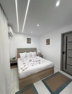 Postel nebo postele na pokoji v ubytování Baha Pyramids Inn