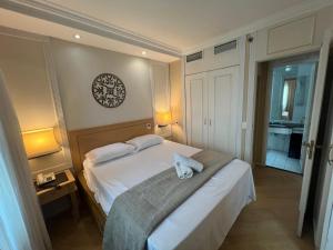 Katil atau katil-katil dalam bilik di Hotel Inter Jardins UH-2307 +14 gambar
