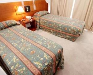 Postel nebo postele na pokoji v ubytování Felence