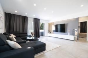 Et opholdsområde på Luxury Villa Entrata