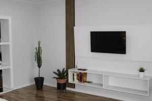 TV a/nebo společenská místnost v ubytování Allegra