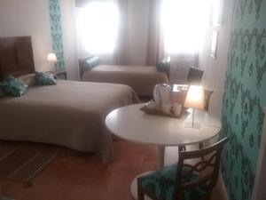 Postel nebo postele na pokoji v ubytování B&B Barberia