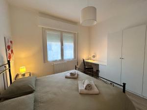 Postel nebo postele na pokoji v ubytování A Casa di Bruna