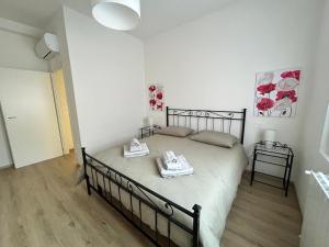 Postel nebo postele na pokoji v ubytování A Casa di Bruna