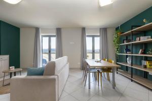 Posezení v ubytování Tuscasì Aparthotel