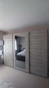 Postel nebo postele na pokoji v ubytování Chez Clochette