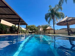 Swimmingpoolen hos eller tæt på Studio Iguatemi Ribeirão Preto