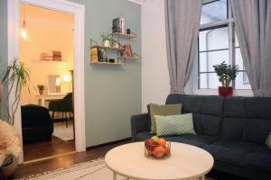 Χώρος καθιστικού στο Reval Residences