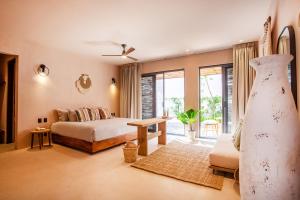 Postel nebo postele na pokoji v ubytování Marakame Suites + 59 fotografií