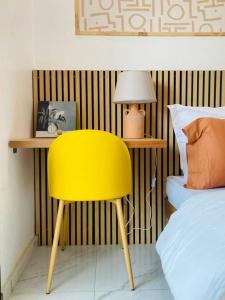 Sublime appartement 2 chambres - Résidence Sabyra客房内的一张或多张床位