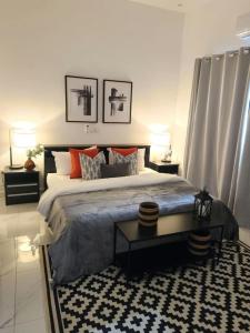 Sublime appartement 2 chambres - Résidence Sabyra的休息区