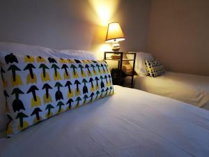 Letto o letti in una camera di Gr8 Hostel at The Mount