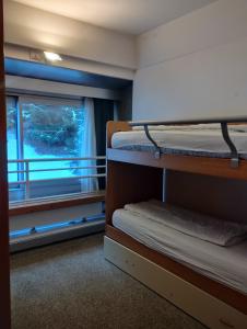 Postel nebo postele na pokoji v ubytování Appartamenti Solaria a Marilleva 1400 by Happy Holidays