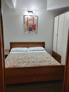 Postel nebo postele na pokoji v ubytování Appartamenti Solaria a Marilleva 1400 by Happy Holidays