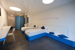 Una cama o camas en una habitación de Chromotel self check-in