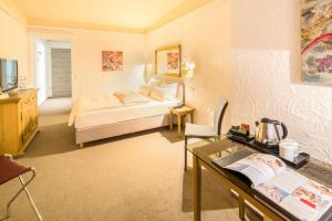 Postel nebo postele na pokoji v ubytování Best Western Hotel Mainz
