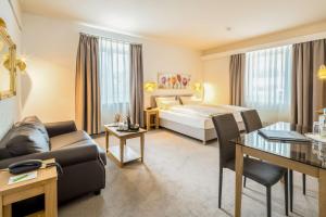Postel nebo postele na pokoji v ubytování Best Western Hotel Mainz