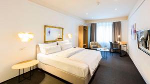 Postel nebo postele na pokoji v ubytování Best Western Hotel Mainz