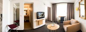 TV a/nebo společenská místnost v ubytování Best Western Hotel Mainz