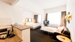 Postel nebo postele na pokoji v ubytování Best Western Hotel Mainz