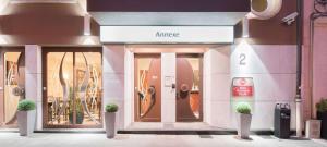 a store front with the entrance to a store at Best Western Plus Grand Hotel Victor Hugo in Luxembourg