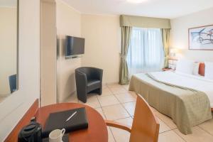 TV o dispositivi per l'intrattenimento presso Best Western Plus Grand Hotel Victor Hugo
