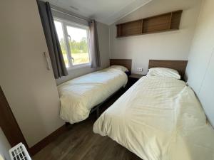 Postel nebo postele na pokoji v ubytování Hoeve Twente - De Torenvalk