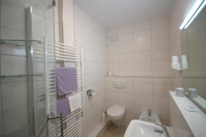 Koupelna v ubytování Hotel Weidenau + 9 fotografií