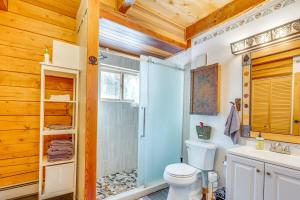 a bathroom with a shower and a toilet and a sink at BBQs, Hikes & Fireside Nights: Cabin in Black Hawk in Black Hawk +26 photos