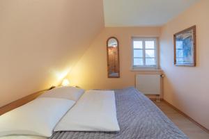 Postel nebo postele na pokoji v ubytování Südfall