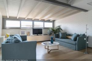 Et opholdsområde på Brera Apartments in San Fermo