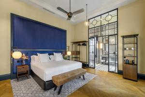 CoolRooms Palacio de Atocha房間的床