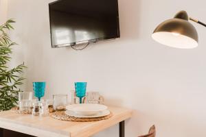 TV/Unterhaltungsangebot in der Unterkunft Rental Holidays Apartment
